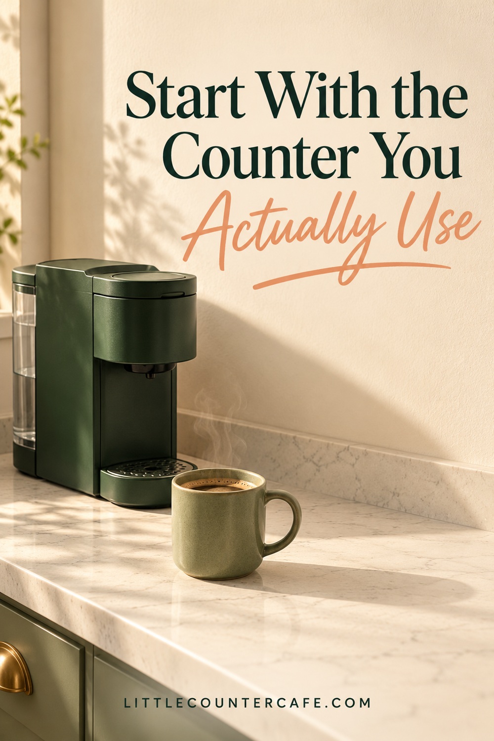 Plain green coffee brewer and sage mug at the left of a clear cream working counter.